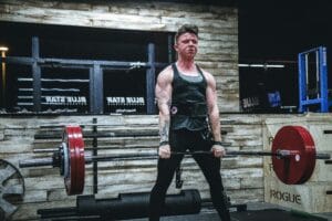 man lifting barbell